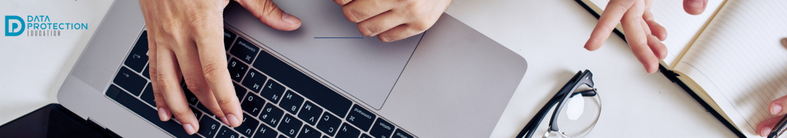 Data Protection education logo, hands on a laptop on a desk with glasses