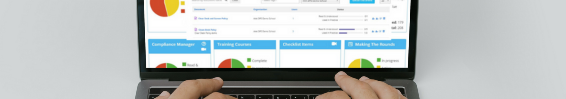 Hands typing on a laptop. Laptop screen shows view of the Compliance manager which is part of the Data Protection Education Knowledge Bank portal.