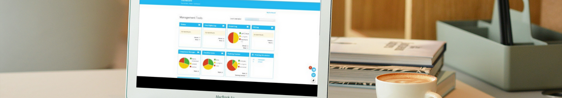 Laptop computer with the DPE Knowledge Bank Dashboard on the display