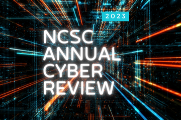 NCSC Annual Cyber Review in white text, 2023 in white text on a blue background.  Background is a tunnel of computer screens (like going through a black hole)